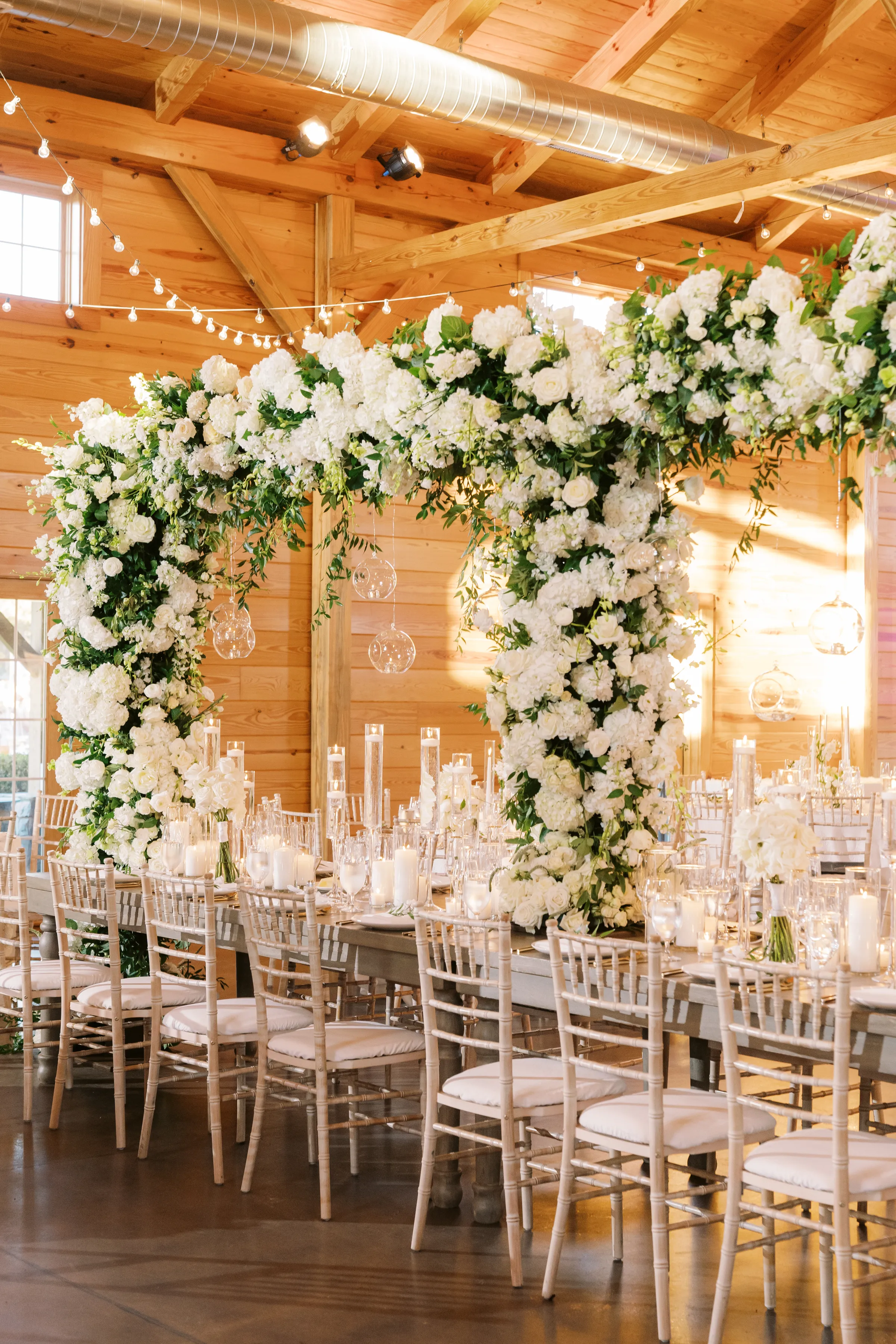 White Floral Arch Reception Environment